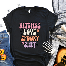 Load image into Gallery viewer, Are you one of the girls that dresses up for Halloween??  Well, I know I am, and I have a whole bunch of BFF&#39;s that also do. So to all of the bitch-witches we know,  CHEERS BITCHES!!!  Just put this shirt on with your black witch&#39;s hat, maybe some black or purple lipstick &amp; what do you feel like?? Like the hot Bitch you are sister!! So get yourself one or both colors &amp; some fabulous lipstick and get out there.... it&#39;s HALLOWEEN!!!   100% ring-spun cotton TTS Unisex