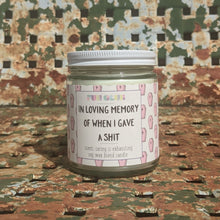 Load image into Gallery viewer, Are you someone that is exhausted, feeling overwhelmed by all of this crap with no help from anyone else?? Me too. So that&#39;s why we have these hilarious candles!!  Smart-ass, funny &amp; sarcasm all rolled into one for your giving pleasure. Make sure they know how you feel.  LOL   4&quot; tall 9 oz soy wax candle, hand poured in the USA Scent: &#39;caring is exhausting&#39;.... Flavorful blood orange with a delicate touch of rose petals. Made in United States of America