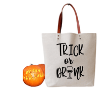 Load image into Gallery viewer, MOM needs her own HALLOWEEN TRICK or DRINK tote bag while takin&#39; the kiddos out for Trick or Treat!!! One bag that you&#39;ll be carrying around all the time!! Your everyday bag that u can use for everything....grocery shopping, farmers market, library bag, book bag &amp; yes, your bag for holding your liquor!!! LOL  My favorite is to use these as a gift bag... giving a gift inside a gift. Like liquor!!! :)  Cotton tote bag with light brown faux leather handle. 15&quot; (w) x 16.5&quot; (h).  All totes are washable!