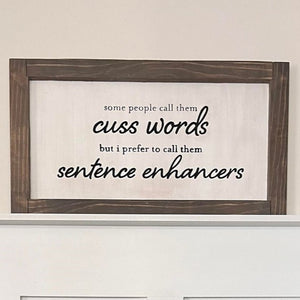 A beautiful HANDMADE, HAND-CUT wood sign made just for YOU when you order. This will fit anywhere in your home, but maybe by the front door is best LOL.   "Some people call them CUSS WORDS, I call them SENTENCE ENHANCERS".   Give as a gift to all your BFF's because u all have the same sense of humor. hahahaha!!! Pine dimentions: 21.5" x 12"